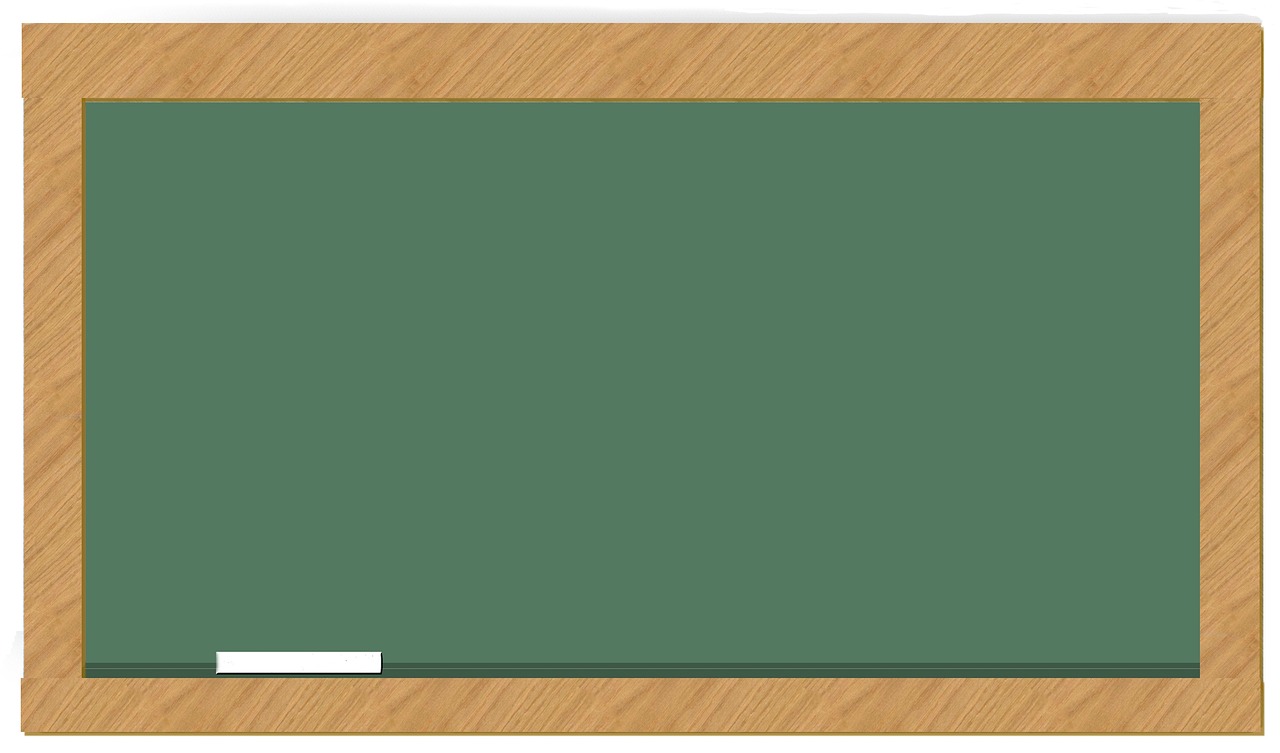 Instructor notes on a chalkboard slate used for range estimation drills